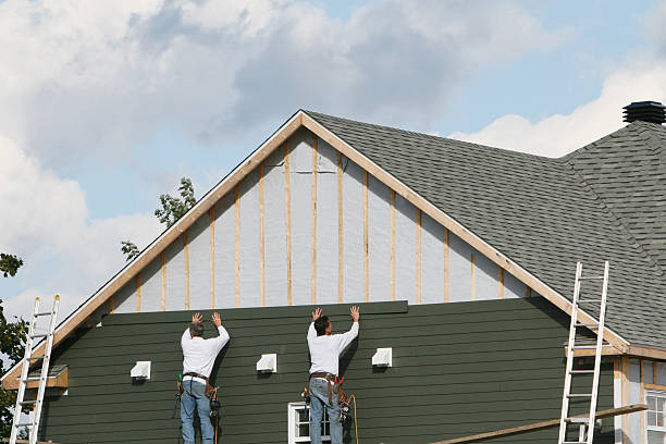 Professional Siding Installation technician working in Alverton, PA